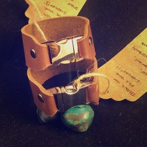 Custome Leather Cuffs with various sized buckles